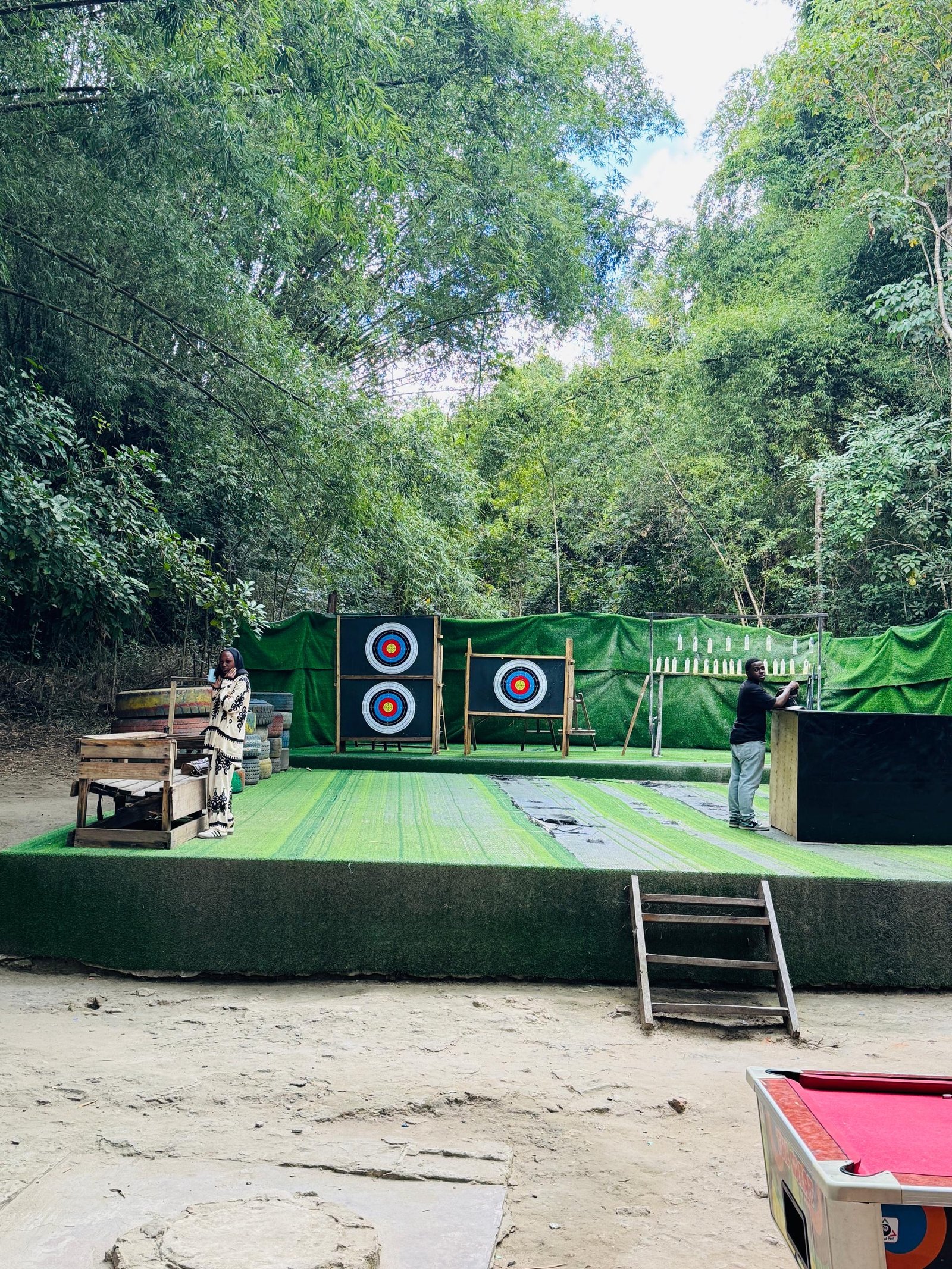 Visitors at the outdoor archery range at the forest reserve